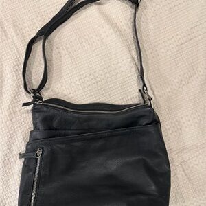 Classic Black Leather Crossbody Bag with Zip Detailing